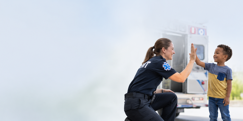 EMT high fiving child banner 3