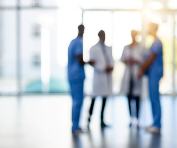 Clinicians talking in lobby
